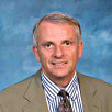 John E.